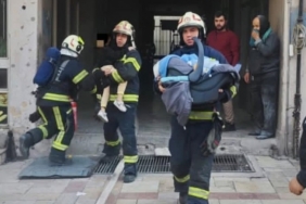 Ev olarak kullanılan iş hanında çıkan yangında 17’si çocuk 21 kişi kurtarıldı