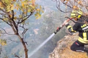 Makilikte çıkan yangın bahçelere ulaşmadan söndürüldü