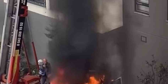 Ev taşıma kabusa döndü... Vinç alev aldı, vatandaşlar damacanayla söndürmeye çalıştı