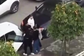 Adana’da koca eşini tartaklayıp, otomobiliyle aracına defalarca vurdu