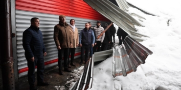 Mehmet Kuş, karda işyerleri zarar gören esnafla buluştu