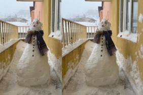 Sağlıkçılardan balkonda kardan adam