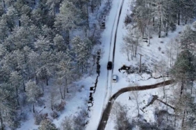Sındırgı’da merkezde yağmur, yüksek kesimlerde kar yağışı etkili oldu