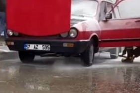 Sinop’ta yanan otomobile esnafın müdahalesi faciayı önledi